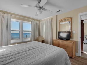 Primary bedroom with flat screen TV