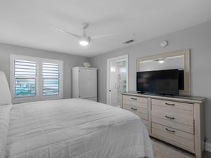 Primary Bedroom with King Bed and Flat Screen TV