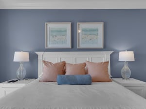 Primary bedroom with coastal vibe