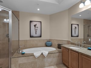 Primary bathroom with walk in shower and soaking tub