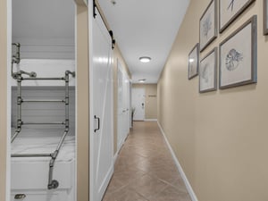 Bunk area off main hallway with barn door for privacy