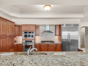 Well Stocked Kitchen with Stainless Steel Appliances