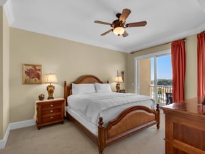 Primary bedroom with balcony access