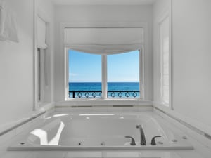 Primary Bathroom on 3rd Floor with Soaking Tub and View of the Gulf