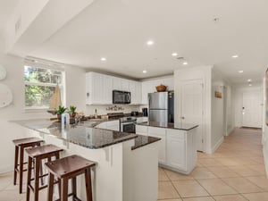 Kitchen with additional breakfast bar seating