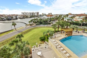 Balcony View of Pool and Grilling Area