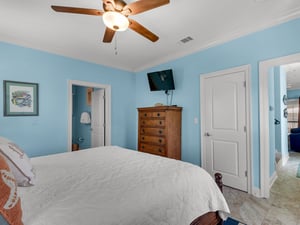 Primary Bedroom on Main Floor with King Bed and Flat Screen TV