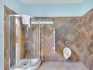 Bathroom 6  Pool Bathroom with Urinal and Stand Alone Shower