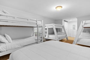 Bedroom 4 on 1st Floor with 2 Triple Bunks, 1 Twin Bunk, 1 Queen