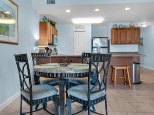 Dining Area with Bar Seating at Kitchen