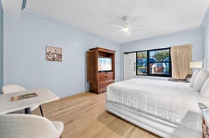 Spacious king Room with TV dresser and dining table