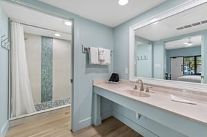 Large vanity and bathroom with walkin shower