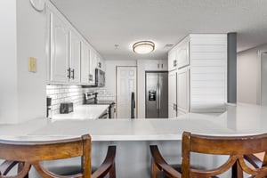 Bar Seating into Kitchen