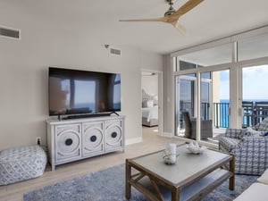 Living Area with Flat Screen TV and Electric Blinds