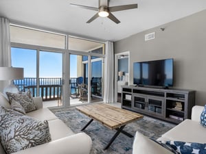 Living Area with Flat Screen and Access to Private Balcony