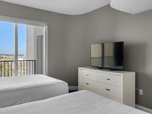 Guest Bedroom 2 with Double and Queen Beds and Flat Screen TV