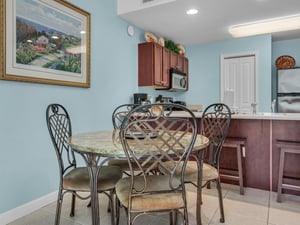 Dining Area with Bar Seating at Kitchen