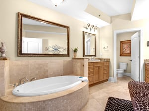 Oversized Primary Bathroom with Walk in Shower and Soaking Tub