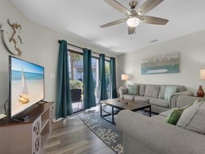 Living Area with Large TV and Patio Access