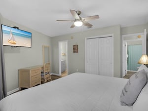 Primary Bedroom with Desk and TV