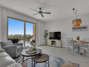 Living Area with Private Balcony and Large TV