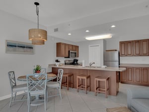 Dining Area with Bar Seating at Kitchen