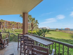 Patio Seating Overlooking the Lush Grounds and Gulf of Mexico