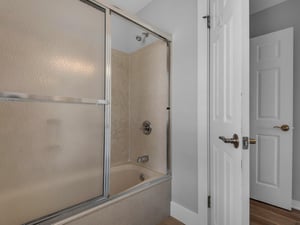 2nd floor guest bathroom with tub shower combo