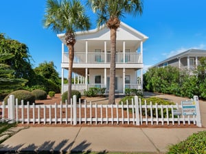 Sunkissed Cottage with white picket fence