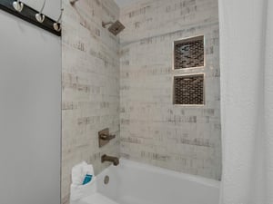 Tub Shower Combo in Front Guest Bathroom