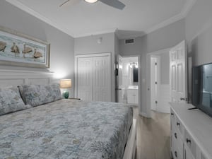 Guest bedroom with king bed and shared bathroom