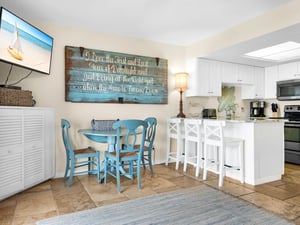 Dining area with breakfast bar seating