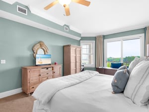 Primary Bedroom with dresser and armoire