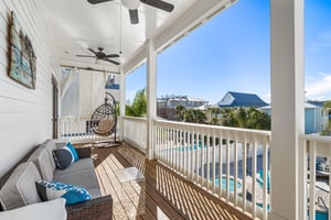 Seating on Balcony Overlooking the Pool on Back of House