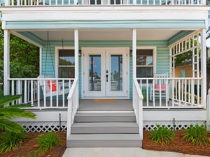 Cute Porch with Porch Swing and Rocking Chair