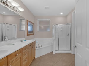 Primary Bathroom with WalkIn Shower and Soaking Tub