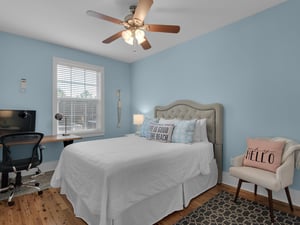 Guest Bedroom with Queen Bed and TV