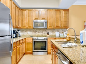 Fully Stocked Kitchen with Stainless Steel Appliances