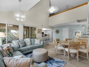 Living and Dining Area with a Private Screened Balcony overlooking the Fountain