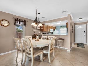 Dining Area with Additional Breakfast Bar Seating 1st Floor