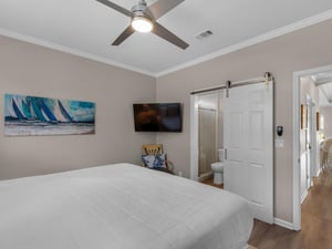 Guest Bedroom with Wall Mounted TV