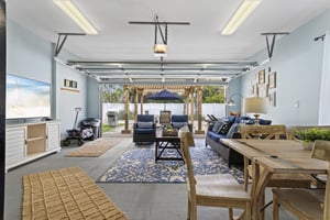 Garage Living Room with Beach Wagon and Fridge