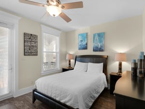 2nd floor guest bedroom with queen bed