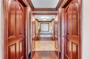 Custom Cherry Closets in Primary Bedroom