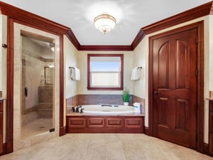 Large Primary Bathroom with WalkIn Shower and Toilet Room