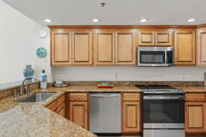 Fully Stocked Kitchen with Stainless Steel Appliances