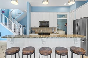 Kitchen with additional breakfast bar seating