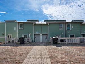 Unit 5 and Unit 6 Parking with Propane Grill on Front Porches