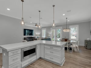 Large island in the kitchen overlooking open floor plan