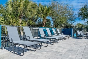 Plenty of lounge chairs to relax under the sun